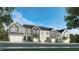 Street view of new townhomes showcasing craftsman-style architecture and varied color schemes at 385 Thompson Overlook Way # 236, Smithfield, NC 27577