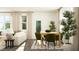 Inviting living and dining areas featuring natural light, modern furnishings, and seamless open-concept living at 385 Thompson Overlook Way # 236, Smithfield, NC 27577