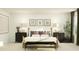 Serene main bedroom with a neutral color palette, decorative pillows, and two bedside tables at 385 Thompson Overlook Way # 236, Smithfield, NC 27577
