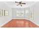 Empty room with hardwood floors and neutral paint at 4 Calwell Creek Dr, Chapel Hill, NC 27517