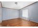 Bedroom showcasing wood-look flooring and a bright, airy feel with a window at 4047 Mistletoe Dr, Burlington, NC 27217