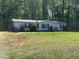 Traditional single-story home with classic siding and a spacious front yard at 4047 Mistletoe Dr, Burlington, NC 27217