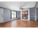 Spacious living room with a fireplace, neutral paint, and ample natural light at 4047 Mistletoe Dr, Burlington, NC 27217