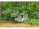 A shed surrounded by foliage at 4047 Mistletoe Dr, Burlington, NC 27217