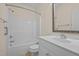 Clean bathroom featuring a shower and tub combo and a decorative framed mirror at 4105 Gilchrist Dr, Burlington, NC 27215
