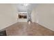 Open-concept living room with tile floors, a view of the modern kitchen, and neutral paint at 4105 Gilchrist Dr, Burlington, NC 27215