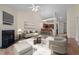 Comfortable living room with fireplace and views into the modern kitchen with bar stool seating at 4105 Gilchrist Dr, Burlington, NC 27215