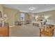 Bright bedroom with natural light, carpeting, and two sitting chairs at 412 Airedale Trl, Garner, NC 27529