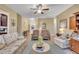 Cozy living area with comfortable seating and a view to the entryway and staircase at 412 Airedale Trl, Garner, NC 27529