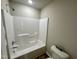 Clean white shower and toilet in bright bathroom at 437 Earnest Way, Kenly, NC 27542