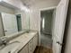 Bathroom with granite countertops, double vanity, and tile flooring at 437 Earnest Way, Kenly, NC 27542