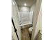 A clean, modern bathroom with a tub, shower, and toilet at 437 Earnest Way, Kenly, NC 27542