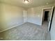 A spacious bedroom featuring plush carpeting and ample natural light at 437 Earnest Way, Kenly, NC 27542