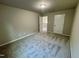 A simple bedroom featuring neutral walls and plush carpeting at 437 Earnest Way, Kenly, NC 27542