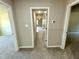 A well-lit hallway with access to rooms on both sides at 437 Earnest Way, Kenly, NC 27542