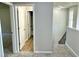 A hallway landing space shows access to other rooms and stairway at 437 Earnest Way, Kenly, NC 27542