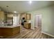 Modern kitchen features stainless steel appliances, granite countertops, and a functional layout with ample storage at 437 Earnest Way, Kenly, NC 27542