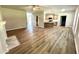 Open floor plan living room showcasing the fireplace and seamless flow to the kitchen at 437 Earnest Way, Kenly, NC 27542