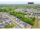 Aerial view of neighborhood indicates nearby park, trees, and the street location at 4408 Walker Hallow St, Raleigh, NC 27616