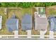 Aerial view of neighborhood showcasing roof lines, backyards, and a basketball court at 4408 Walker Hallow St, Raleigh, NC 27616