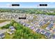Neighborhood aerial view showcasing proximity to downtown Raleigh and North Hills; lush greenery and well-maintained homes at 4408 Walker Hallow St, Raleigh, NC 27616