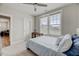 Bright bedroom with carpet, natural light, a ceiling fan, and neutral wall colors at 4408 Walker Hallow St, Raleigh, NC 27616