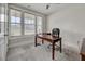 Bright office space with a ceiling fan, neutral carpet, and ample natural light at 4408 Walker Hallow St, Raleigh, NC 27616
