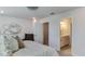 View of an elegant main bedroom with an ensuite bathroom and adjacent walk-in closet at 444 Deercroft Dr, Apex, NC 27539