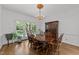 Charming dining area with access to the outdoor deck at 4533 Wood Valley Dr, Raleigh, NC 27613