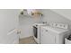 Practical laundry room with modern washer and dryer at 4533 Wood Valley Dr, Raleigh, NC 27613