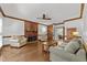 Spacious living room with hardwood floors and a cozy fireplace at 4533 Wood Valley Dr, Raleigh, NC 27613