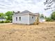 Exterior view of a house with a large yard at 58 S Grace Way, Henderson, NC 27537