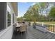Inviting deck with outdoor dining set and seating area, perfect for entertaining and relaxation at 6024 Lunenburg Dr, Raleigh, NC 27603
