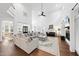 Spacious living room with a fireplace, soaring ceilings, and modern decor at 6024 Lunenburg Dr, Raleigh, NC 27603