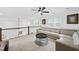 Upstairs living room with a large sectional sofa and views to the downstairs common area at 6024 Lunenburg Dr, Raleigh, NC 27603