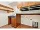 Laundry room features cabinetry, a stainless sink, countertop space and washer and dryer hookups at 673 Brookview Dr, Chapel Hill, NC 27514