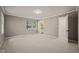 Inviting bedroom with a scenic window view and connecting doors, perfect for relaxation and privacy at 6804 Justice Dr, Raleigh, NC 27615