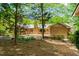 Brick home featuring a spacious wooden deck, perfect for outdoor entertaining at 7 Dubarry Ct, Durham, NC 27705