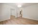 Elegant dining room with hardwood floors and stylish lighting, perfect for entertaining guests at 7 Dubarry Ct, Durham, NC 27705