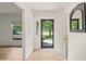 Inviting foyer with an open front door and views of the beautiful outdoors, showcasing natural light at 7 Dubarry Ct, Durham, NC 27705