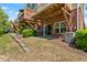 Backyard featuring a swing and patio under wood decks with a brick exterior at 705 Samuel Cary Dr, Cary, NC 27511