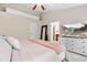 Main bedroom featuring plush carpet, a ceiling fan, and access to a large closet at 705 Samuel Cary Dr, Cary, NC 27511