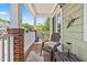 Cozy porch with comfortable seating, an accent hummingbird, and relaxing outdoor ambiance at 705 Samuel Cary Dr, Cary, NC 27511