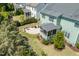Aerial view of the home showcasing a beautiful backyard, screened porch, and well-maintained landscaping at 7101 Gibson Creek Pl, Cary, NC 27519