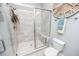 Clean, modern bathroom with glass-enclosed shower featuring a built-in bench at 7101 Gibson Creek Pl, Cary, NC 27519