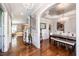 Elegant dining room featuring hardwood floors, decorative lighting, and a spacious layout at 7101 Gibson Creek Pl, Cary, NC 27519