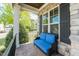Cozy front porch with a comfortable bench, perfect for enjoying the outdoors at 7101 Gibson Creek Pl, Cary, NC 27519