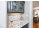 Kitchen nook with granite countertops and cabinets at 7101 Gibson Creek Pl, Cary, NC 27519