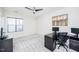 Office with neutral walls, carpet, and multiple monitors at 7101 Gibson Creek Pl, Cary, NC 27519