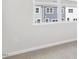 Bedroom with carpet and lots of natural light looking out to view of exterior houses at 764 Dorset Stream Dr, Fuquay Varina, NC 27526